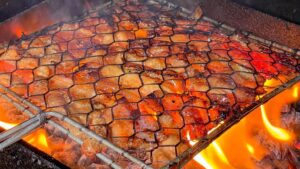 Smoky grilling Bun Cha Hanoi.